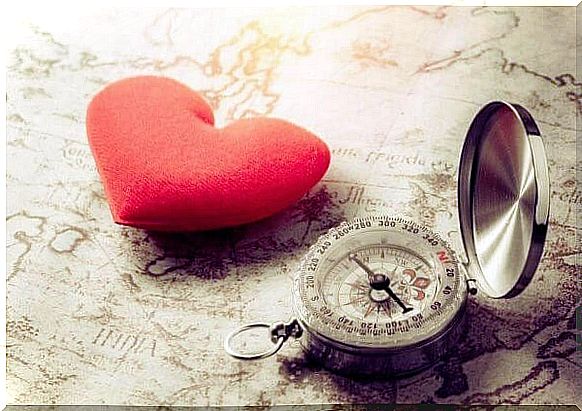 A map with a heart and a compass on it