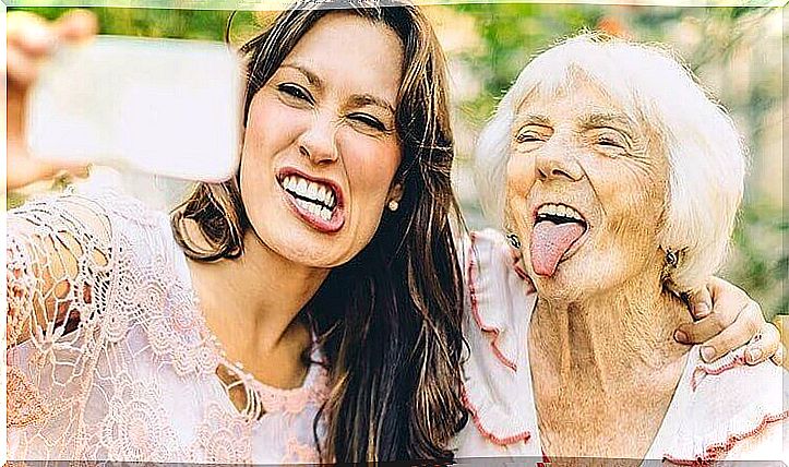 Young and old women take a selfie