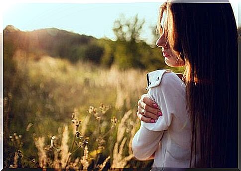 Thoughtful woman in the great outdoors