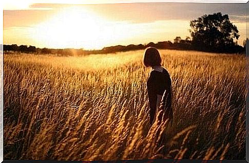 Woman in wheat field