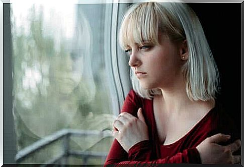 Electroconvulsive therapy - depressed woman at the window