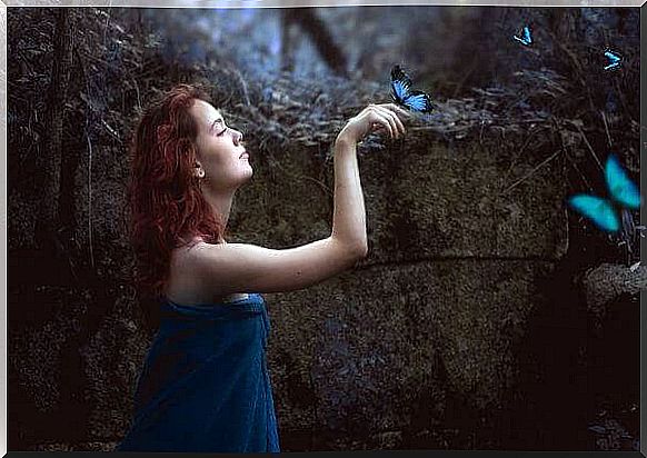 Woman with blue butterflies