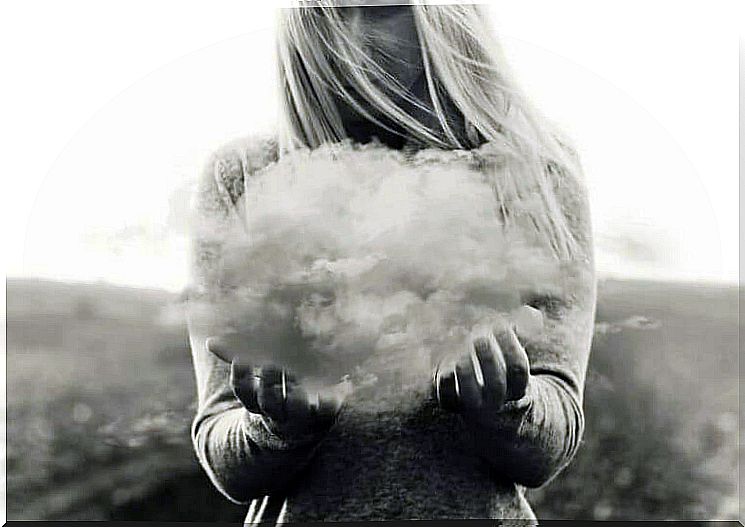 Woman holding a cloud