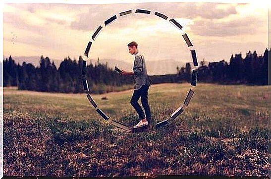 Boy walks in a circle from books